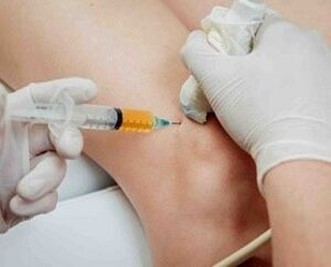 prik bij knieschijf met echogeleide